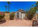 Backyard shed with side yard access, providing extra storage space and functionality to this property at 7426 W Cholla St, Peoria, AZ 85345