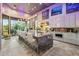 Modern kitchen featuring a large island, stainless steel appliances, and seamless indoor/outdoor flow at 7846 E Wilderness Trl, Gold Canyon, AZ 85118