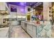 Spacious kitchen with marble countertops, large island and stainless steel appliances at 7846 E Wilderness Trl, Gold Canyon, AZ 85118