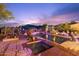 Tranquil pool and spa area with stunning desert views and landscaping at 7846 E Wilderness Trl, Gold Canyon, AZ 85118