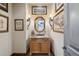 Charming powder room features a decorative mirror, sconces and granite countertop at 7846 E Wilderness Trl, Gold Canyon, AZ 85118