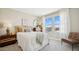Comfortable bedroom features natural light, minimalist decor, and cozy textures at 8030 W Griswold Rd, Peoria, AZ 85345