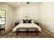 Bright main bedroom suite with modern decor and a window with natural light at 8910 E Topeka Dr, Scottsdale, AZ 85255