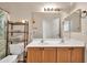 Bathroom with dual sinks, and a large mirror at 8968 W Adam Ave, Peoria, AZ 85382
