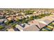 Stunning aerial view of tree-lined streets with beautiful homes in a desirable neighborhood at 9764 E Thornbush Ave, Mesa, AZ 85212