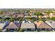 Attractive aerial perspective highlighting a peaceful neighborhood with varied home styles and mature trees at 9764 E Thornbush Ave, Mesa, AZ 85212