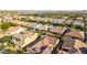 Beautiful neighborhood aerial showcasing well-kept homes and manicured green spaces in a Gathering-friendly community at 9764 E Thornbush Ave, Mesa, AZ 85212