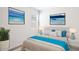 Light and airy bedroom featuring modern decor and comfortable bedding at 10608 W Sonrisas St, Tolleson, AZ 85353