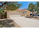 Attractive single-Gathering home with a two-car garage, desert landscaping, and a classic terracotta tile roof at 11256 E Sunnyside Dr, Scottsdale, AZ 85259