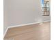Bright room with wood-look flooring and a window at 1126 W Elliot Rd # 2023, Chandler, AZ 85224
