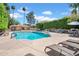 Community pool with lounge chairs, offering a refreshing outdoor experience at 1126 W Elliot Rd # 2023, Chandler, AZ 85224