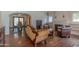 Cozy living room showcasing hardwood floors, classic furniture, and traditional fireplace at 1134 W Portland St, Phoenix, AZ 85007
