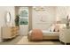 Bright bedroom featuring a modern dresser, pendant lighting, and a neutral color palette at 11952 W Calle De Pompas --, Peoria, AZ 85383