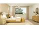Cozy bedroom features lamps, nightstands, light fixture, bench and window with natural light at 11952 W Calle De Pompas --, Peoria, AZ 85383