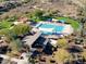 Aerial view of a community pool, ramada, and playground at 12118 W Dove Wing Way, Peoria, AZ 85383