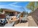 Great backyard with fire pit, outdoor seating, and play equipment for outdoor fun at 12118 W Dove Wing Way, Peoria, AZ 85383