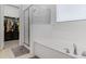 Bright bathroom featuring a soaking tub, shower, and direct access to the walk-in closet at 12118 W Dove Wing Way, Peoria, AZ 85383