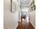 Inviting hallway with hardwood floors leading into a bright living space at 12118 W Dove Wing Way, Peoria, AZ 85383
