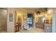 Well-lit bathroom with dual sinks, walk-in shower, archway, and plenty of counter and cabinet space at 136 E Desert Wind Dr, Phoenix, AZ 85048