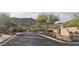 Whistling Rock gated community entrance with desert landscaping and mountain views at 136 E Desert Wind Dr, Phoenix, AZ 85048