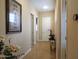 Hallway features hardwood floors, neutral walls, with views of the home's interior and architectural details at 136 E Desert Wind Dr, Phoenix, AZ 85048