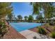 Outdoor community basketball court offers residents a convenient space to play the game within the neighborhood at 14180 W Willow Ave, Surprise, AZ 85379
