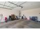 Spacious two-car garage providing ample room for parking and storage, plus an electric car charger at 14180 W Willow Ave, Surprise, AZ 85379