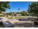 Picturesque community park featuring walking paths, benches, grassy areas, and well-maintained landscaping, inviting residents at 14180 W Willow Ave, Surprise, AZ 85379