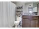Clean bathroom featuring a shower with a white curtain, modern vanity, and granite counters at 14404 N Boxwood Ln, Fountain Hills, AZ 85268