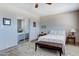 Relaxing bedroom featuring a mirrored closet and a comfortable queen-sized bed at 14404 N Boxwood Ln, Fountain Hills, AZ 85268