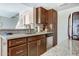 Stylish kitchen showcasing ample cabinet space and modern stainless steel appliances at 14404 N Boxwood Ln, Fountain Hills, AZ 85268