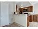 Efficient kitchen with a breakfast bar, and wooden cabinets at 14404 N Boxwood Ln, Fountain Hills, AZ 85268
