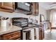 Well-equipped kitchen featuring granite countertops, modern appliances, and ample cabinet space at 14404 N Boxwood Ln, Fountain Hills, AZ 85268