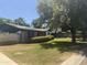 Charming single story home featuring mature trees, large lawn and privacy bushes at 1447 E Town And Country Ln, Phoenix, AZ 85014