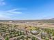Community amenities including baseball field, pool, and green spaces are showcased in this aerial image at 15050 N Thompson Peak Pkwy # 1001, Scottsdale, AZ 85260