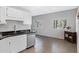 Bright eat-in kitchen with neutral color palette, stainless appliances, and plenty of counter space at 15050 N Thompson Peak Pkwy # 1001, Scottsdale, AZ 85260