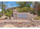 Welcome to Villages North, with prominent community signage and desert landscaping at 15050 N Thompson Peak Pkwy # 1001, Scottsdale, AZ 85260