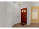 Bright entryway featuring a wood front door and neutral paint at 16002 E Gleneagle Dr, Fountain Hills, AZ 85268