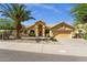Inviting single-Gathering home with desert landscaping, a tile roof, and attached garage at 16002 E Gleneagle Dr, Fountain Hills, AZ 85268