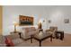 Open-concept living room with neutral walls and comfortable seating at 16002 E Gleneagle Dr, Fountain Hills, AZ 85268