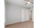 Bedroom featuring a ceiling fan and a large closet at 17220 N 55Th Ave, Glendale, AZ 85308