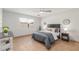Bright bedroom boasts natural light, a ceiling fan, and warm neutral decor at 17220 N 55Th Ave, Glendale, AZ 85308