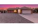 Charming single-story brick home featuring a two-car garage and low-maintenance gravel front yard at 17220 N 55Th Ave, Glendale, AZ 85308