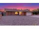 Charming single-story brick home featuring a two-car garage and low-maintenance gravel front yard at 17220 N 55Th Ave, Glendale, AZ 85308