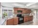Bright kitchen featuring modern appliances, neutral countertops, and ample cabinet space at 17220 N 55Th Ave, Glendale, AZ 85308