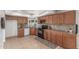Functional kitchen with ample cabinet space and black appliances at 17220 N 55Th Ave, Glendale, AZ 85308