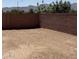 Large backyard with block fence and mountain views at 17324 W Royal Palm Rd, Waddell, AZ 85355