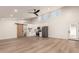 Bright, open-concept kitchen and living area with modern finishes and fixtures at 1736 N Ashbrook Cir, Mesa, AZ 85213
