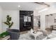 Cozy living room showcasing a modern fireplace, comfortable seating, and sleek design elements at 1736 N Ashbrook Cir, Mesa, AZ 85213