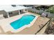 A sparkling pool surrounded by low-maintenance landscaping provides a relaxing outdoor oasis at 1736 N Ashbrook Cir, Mesa, AZ 85213